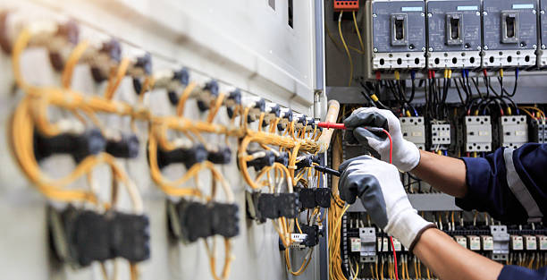Professional Electrician technician working in Normandy, MO